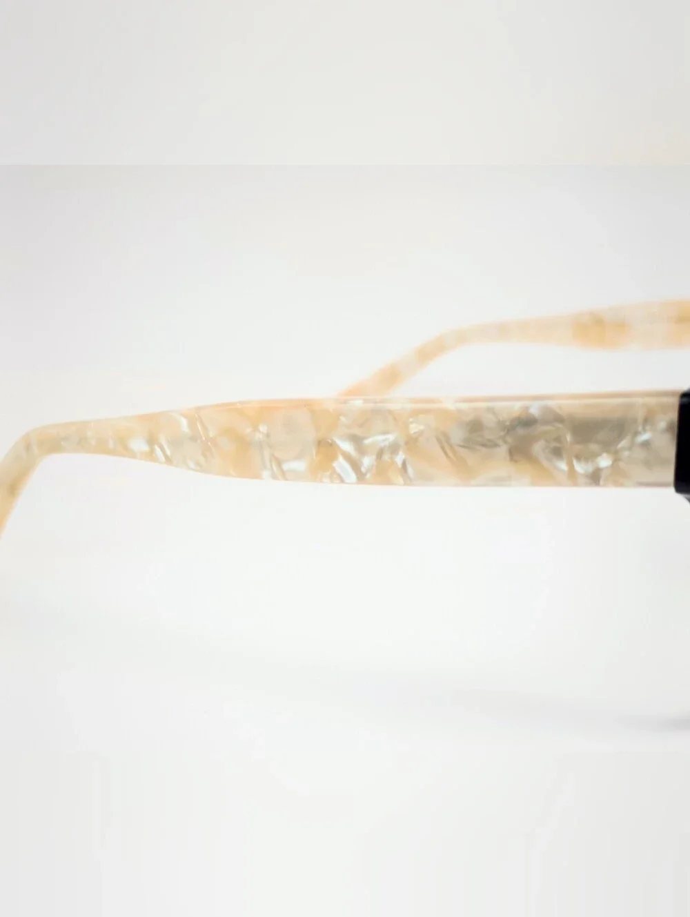 Fluoresce. Black Wayfarer-Style Eyeglasses with Pearl Temples.